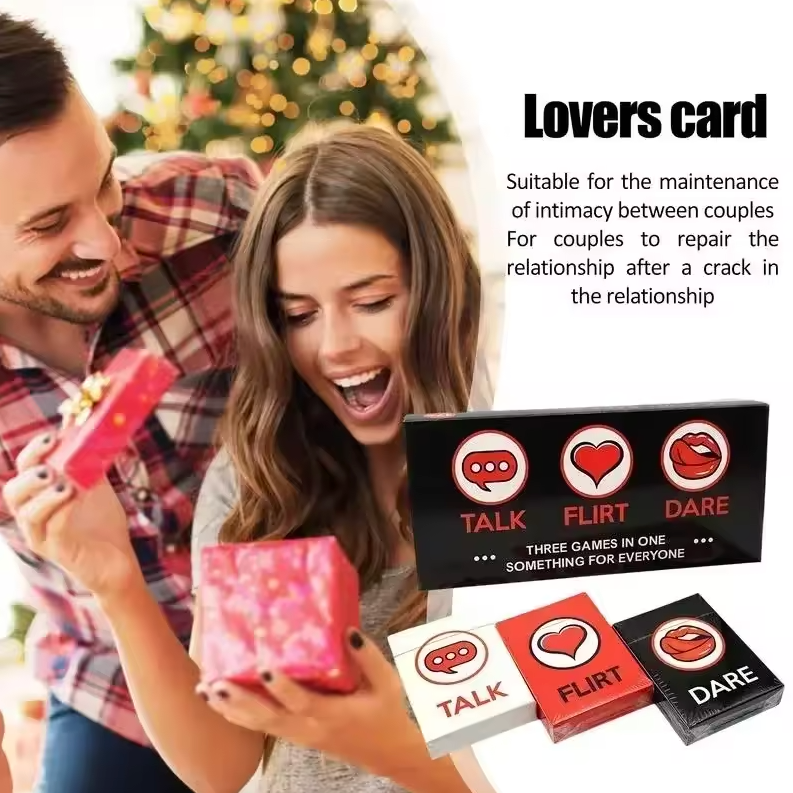 Couple opening a gift with 'Lovers Card' game box and cards in the foreground.