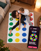 Couple playing Stripster on the mat with the app on a phone